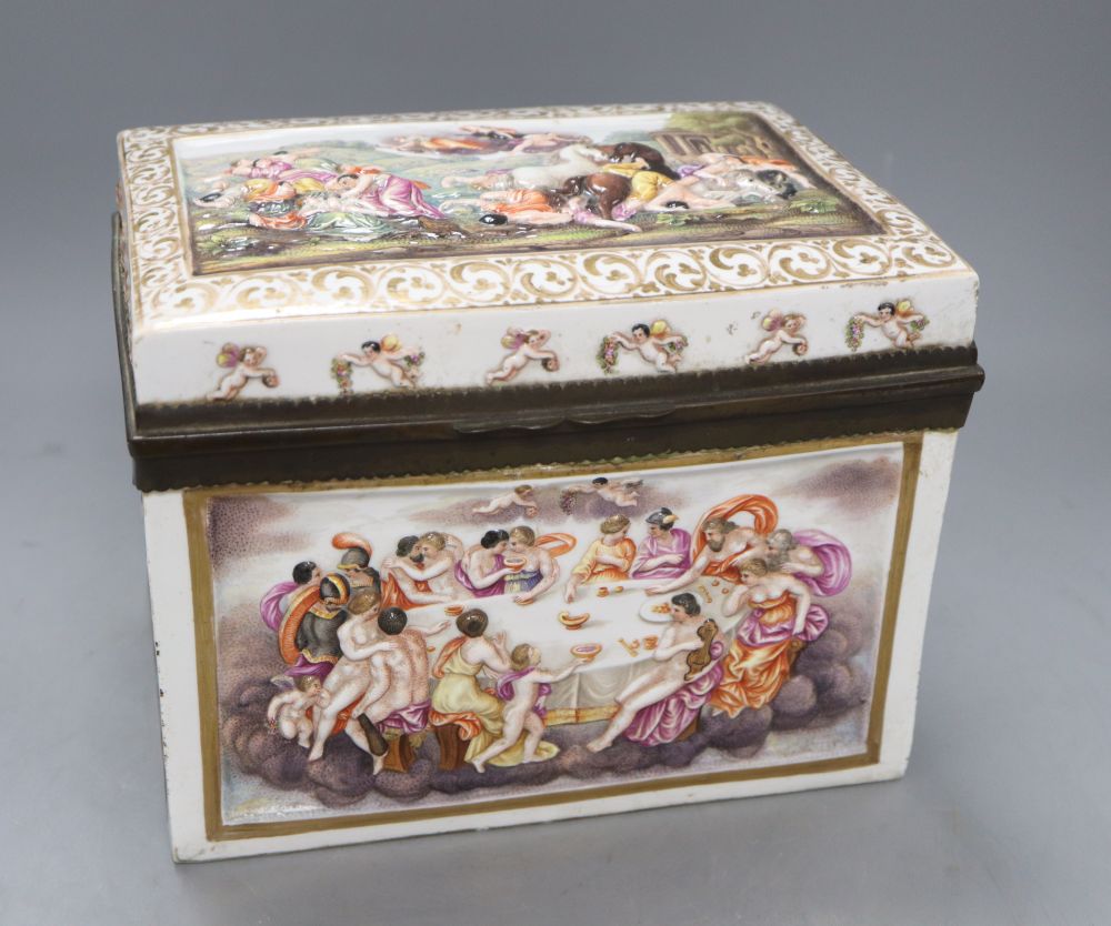 An Italian pottery casket, probably Naples, relief moulded and painted with scenes of revelry and the Rapture, c.1860, height 17cm widt